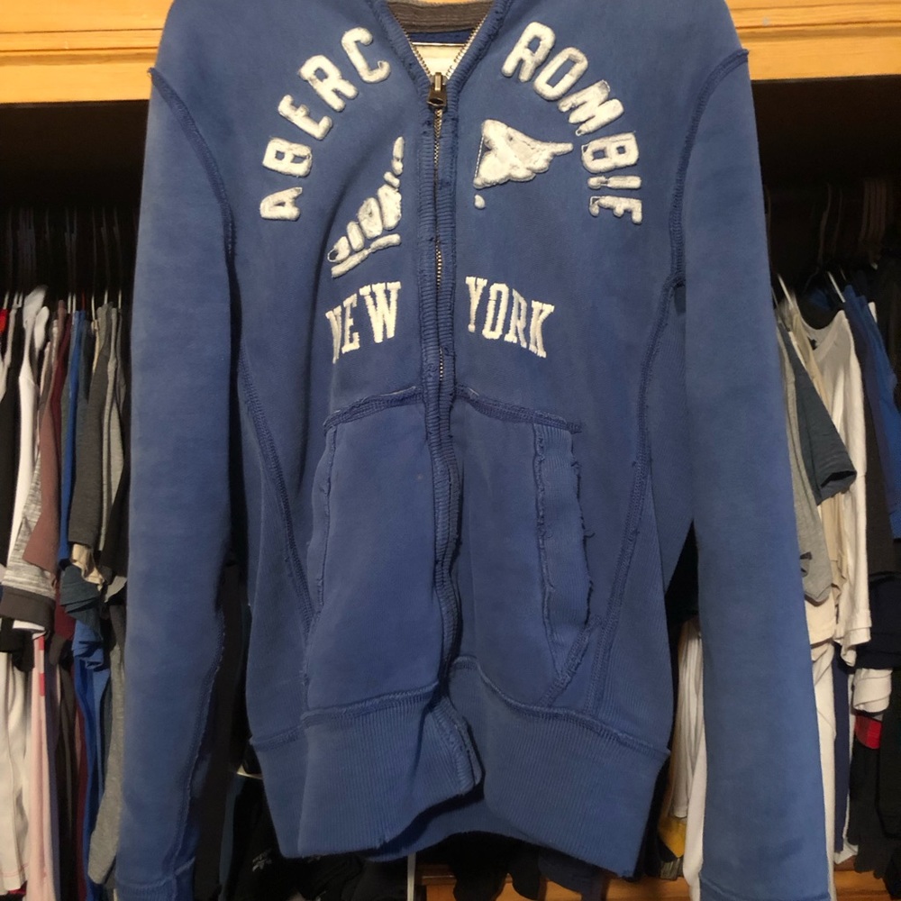 It’s a Abercrombie and fitch blue zip up jacket. Men’s small